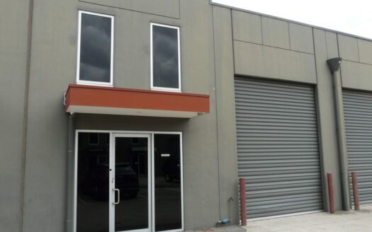 Front facade for warehouse and office for lease in airport west.