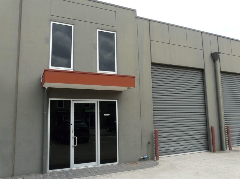 Front facade for warehouse and office for lease in airport west.