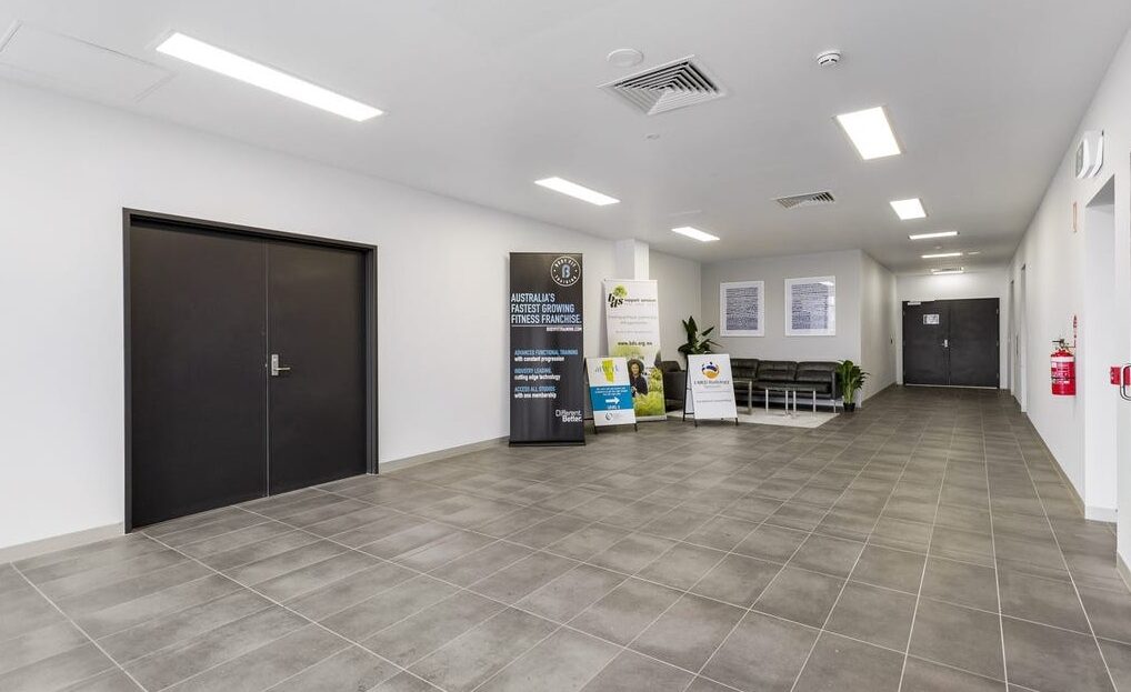 Flexible medical or allied health tenancy with tables and display boards in Craigieburn Junction at Craigieburn Specialist Centre