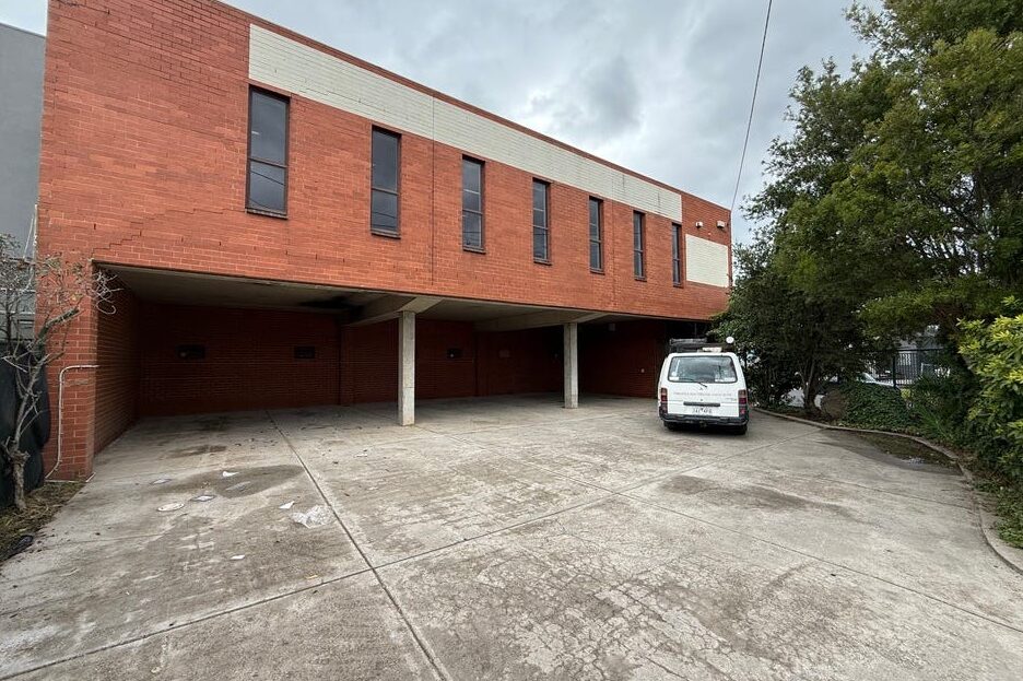Rear view with undercover car parking at 2 Disney Avenue Keilor East industrial building