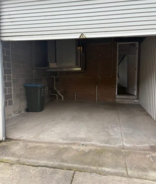 Rear roller door access with undercover car space . Versatile commercial space Keilor East